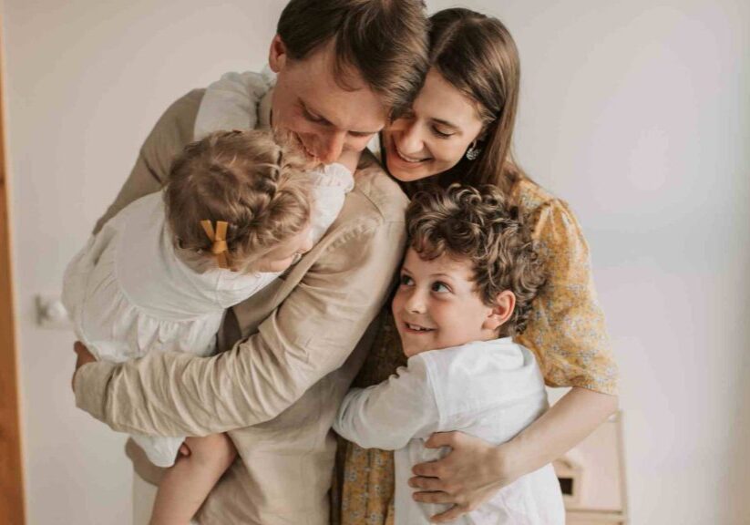 AETrusts_Family hugging Family hugging