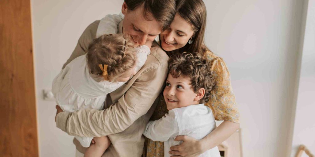 AETrusts_Family hugging Family hugging